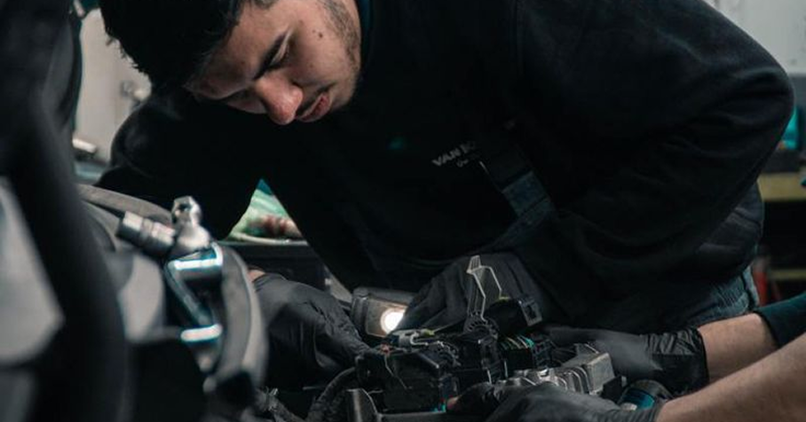 Mechanic working on engine